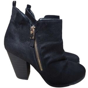 Call it Spring Heeled boot jet black ankle bootie with gold‎ zippers curved toe